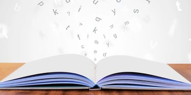 A book with letters which symbolizes learning german language and grammar