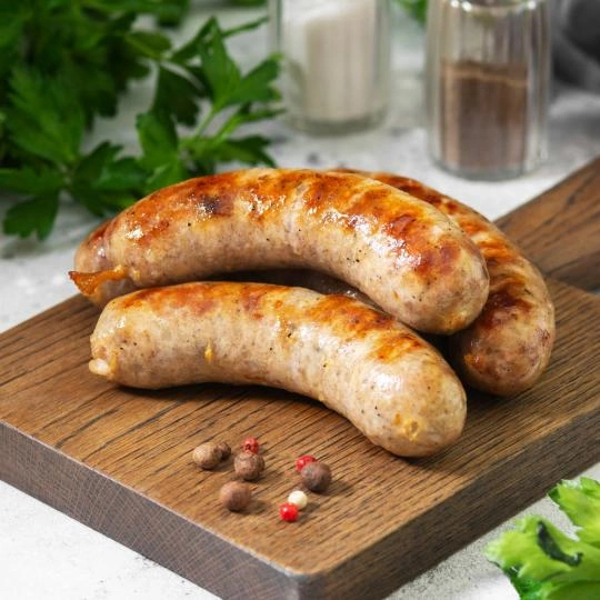 grilled-sausages-on-wooden-board