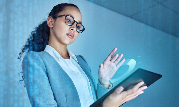 lets-bring-this-closer-shot-attractive-young-businesswoman-standing-alone-office-using-digital-tablet 1